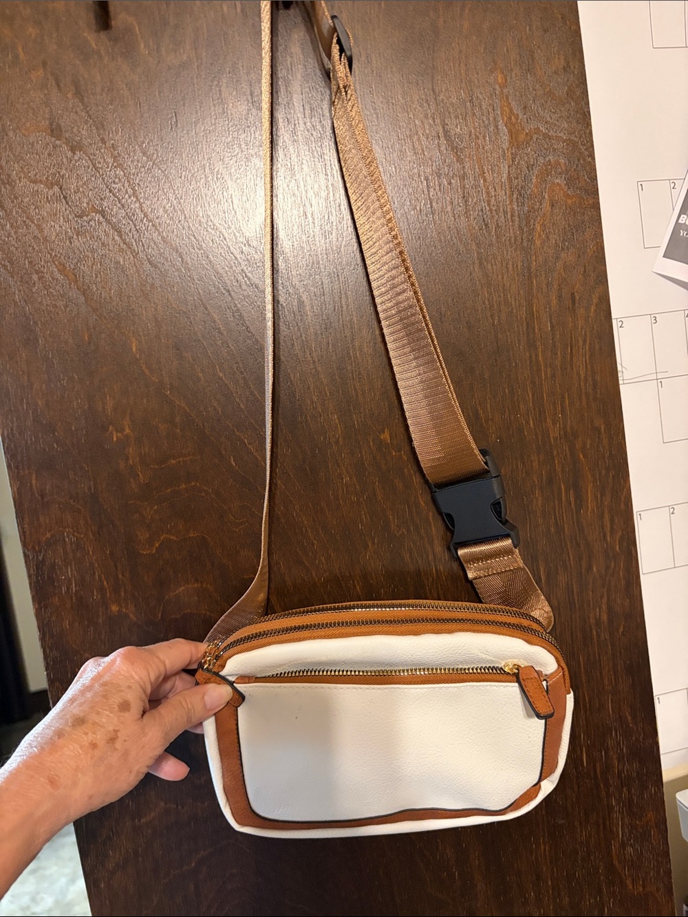 White tan wear across you shoulders fanny pak
